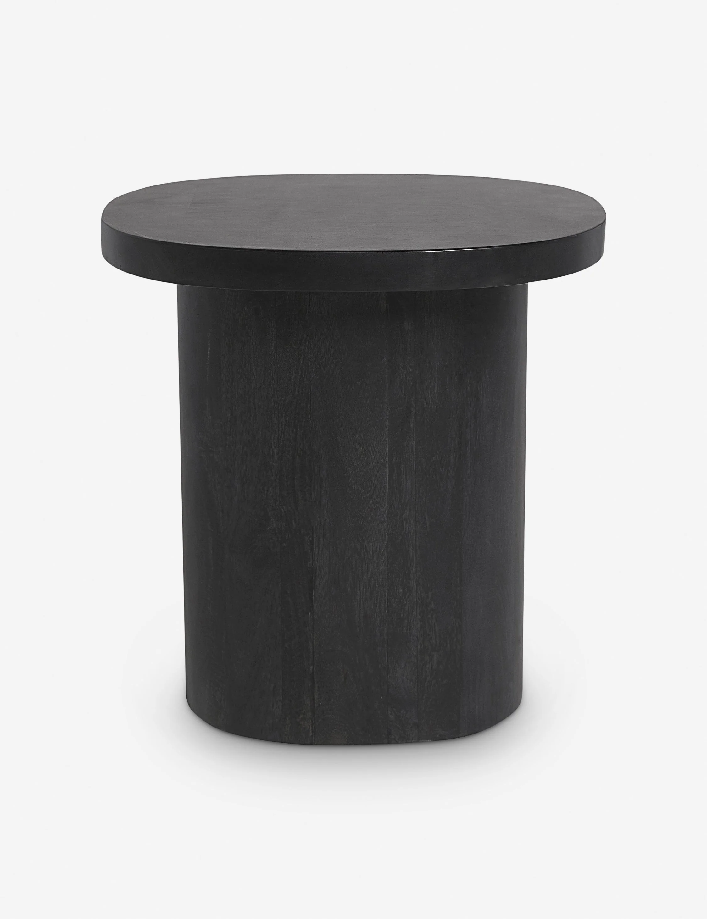 Table A clean, rounded form contrasts the rugged appeal of this wood side table. The detail-rich grain and minimalist lines come together in