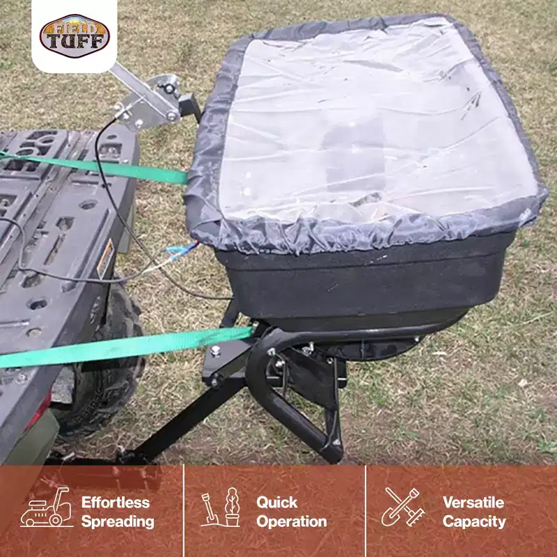 Field Tuff 12V 125 Pound Capacity Grass Seed Fertilizer Spreader with Hitch Mount Receiver and Rain Protector for ATV, UTV, or Utility Tractor