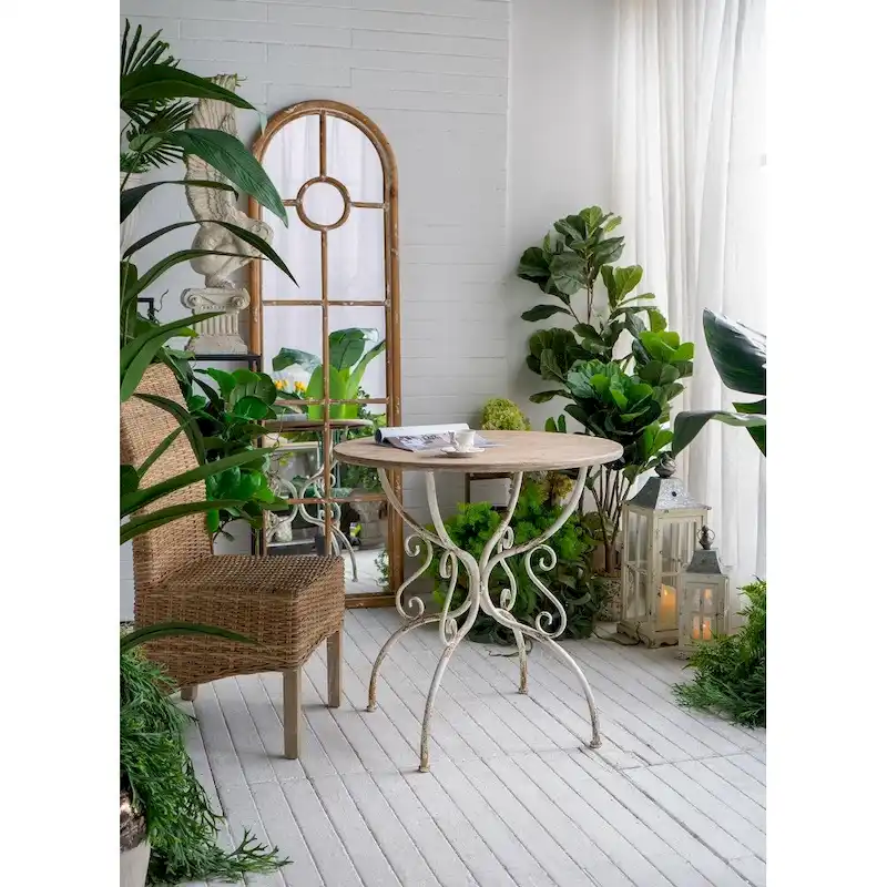Round Wooden Table with Metal Scrollwork Legs